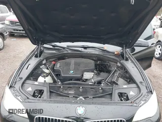 2013 BMW 5 Series 528i with VIN WBAXG5C54DD231297, listed as a IAAI auction lot 41209069 with 79,878 mi miles and . Bid and sale history available at carsss.com. Image 10.