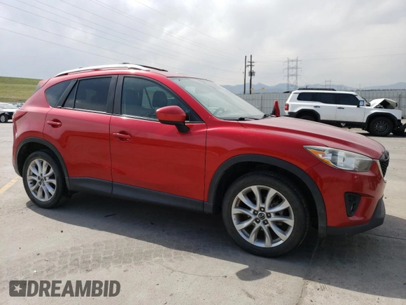 2015 Mazda CX-5 Grand Touring with VIN JM3KE4DY3F0441896, listed as a Copart auction lot 54210025 with 170,308 mi miles and Clean Title. Bid and sale history available at carsss.com. Image 4.