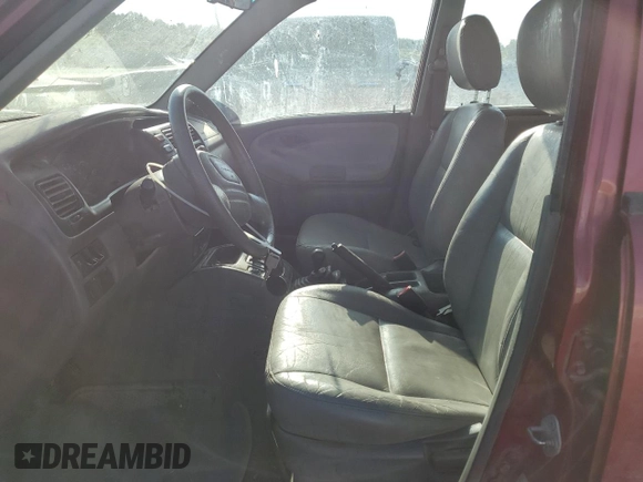 2001 Chevrolet Tracker LT z VIN 2CNBJ634716945832, wystawiony jako Copart lot #61967345 z przebiegiem 136 403 mil mil oraz Szkoda całkowita • Salvage title. Historia ofert i sprzedaży dostępna na DreamBid. Obrazek 7.