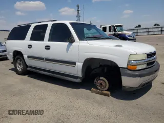 2005 Chevrolet Suburban LS with VIN 3GNEC16Z25G104721, listed as a Copart auction lot 55809235 with 236,590 mi miles and Salvage title. Bid and sale history available at DreamBid. Image 4.