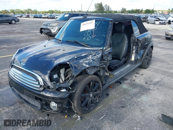 2010 MINI Convertible with VIN WMWMR3C54ATU96904, listed as a IAAI auction lot 39151247 with 109,019 mi miles and . Bid and sale history available at DreamBid. Image 6.