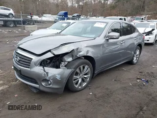 2012 Infiniti M with VIN JN1BY1AR0CM390473, listed as a IAAI auction lot 41638674 with 93,702 mi miles. Bid and sale history available at carsss.com. Image 2.