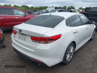 2018 Kia Optima S with VIN 5XXGT4L36JG265878, listed as a IAAI auction lot 42302801 with 101,927 mi miles and . Bid and sale history available at DreamBid. Image 6.