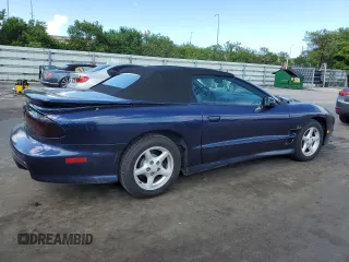 1999 Pontiac Firebird Trans Am with VIN 2G2FV32GXX2229175, listed as a Copart auction lot 65678225 with 180,298 mi miles and Salvage title. Bid and sale history available at DreamBid. Image 3.