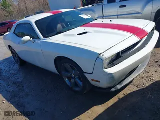 2013 Dodge Challenger SXT with VIN 2C3CDYAG2DH510772, listed as a IAAI auction lot 41417597 with 131,087 mi miles. Bid and sale history available at carsss.com. Image 1.