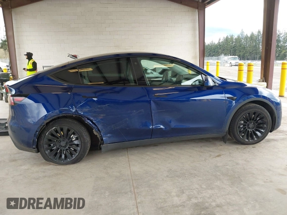 2023 Tesla Model Y Long Range with VIN 7SAYGDEEXPF621397, listed as a IAAI auction lot 41922714 with 29,460 mi miles. Bid and sale history available at carsss.com. Image 13.