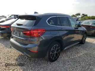 2021 BMW X1 xDrive28i with VIN WBXJG9C09M5T96327, listed as a Copart auction lot 49876493 with 42,572 mi miles. Bid and sale history available at carsss.com. Image 3.