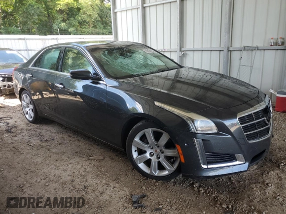 2014 Cadillac CTS Performance RWD with VIN 1G6AS5S37E0140091, listed as a Copart auction lot 60694094 with 130,587 mi miles and Salvage Title. Bid and sale history available at DreamBid. Image 4.