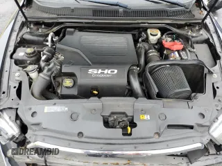 2013 Ford Taurus SHO with VIN 1FAHP2KT6DG211496, listed as a Copart auction lot 63424445 with 123,742 mi miles and Salvage title. Bid and sale history available at DreamBid. Image 11.