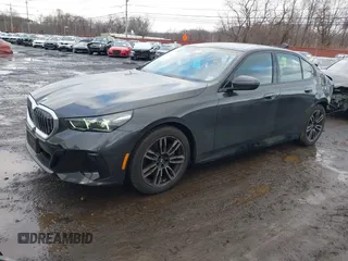 2025 BMW 5 Series 530i xDrive with VIN WBA53FJ01SCT82794, listed as a IAAI auction lot 41575089 with 2,806 mi miles. Bid and sale history available at carsss.com. Image 2.