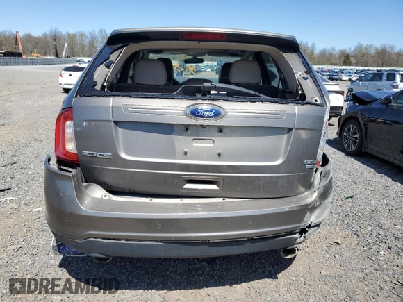 2014 Ford Edge SEL z VIN 2FMDK4JC7EBA36345, wystawiony jako Copart lot #53434145 z przebiegiem 184 955 mil mil oraz Szkoda całkowita • Salvage title. Historia ofert i sprzedaży dostępna na DreamBid. Obrazek 6.