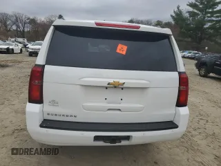 2019 Chevrolet Suburban LT with VIN 1GNSKHKC6KR205434, listed as a Copart auction lot 53950265 with 104,384 mi miles and Salvage Title. Bid and sale history available at DreamBid. Image 6.