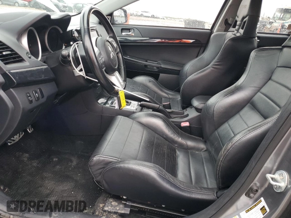 2012 Mitsubishi Lancer Evolution MR z VIN JA32W5FV5CU013118, wystawiony jako Copart lot #51825555 z przebiegiem 119 651 mil mil oraz Czysty tytuł • Clean title. Historia ofert i sprzedaży dostępna na DreamBid. Obrazek 7.