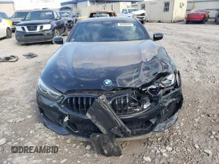 2022 BMW 8 Series M850i xDrive z VIN WBABC4C01NCJ64525, wystawiony jako Copart lot #83996594 z przebiegiem Nie podano mil oraz Szkoda całkowita • Salvage title. Historia ofert i sprzedaży dostępna na DreamBid. Obrazek 5.