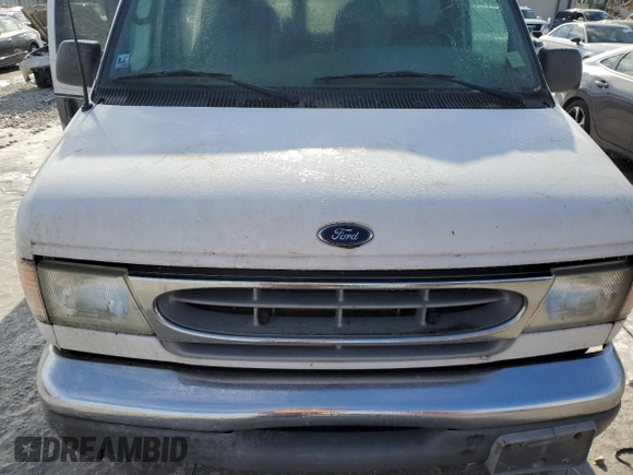 2002 Ford Econoline Cargo with VIN 1FDRE14WX2HB48802, listed as a Copart auction lot 44194335 with 140,559 mi miles and Clean Title. Bid and sale history available at DreamBid. Image 12.