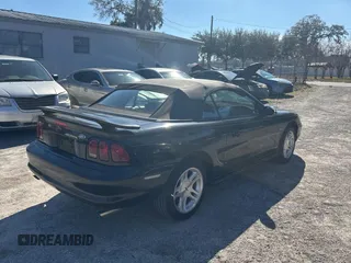 1998 Ford Mustang GT with VIN 1FAFP45X3WF197020, listed as a Copart auction lot 43796325 with 74,844 mi miles and Salvage Title. Bid and sale history available at carsss.com. Image 4.