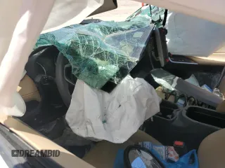 2021 Toyota RAV4 XLE Premium z VIN 2T3A1RFV0MW153326, wystawiony jako Copart lot #57799785 z przebiegiem Nie podano mil oraz Szkoda całkowita • Salvage title. Historia ofert i sprzedaży dostępna na DreamBid. Obrazek 8.