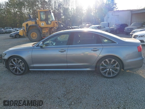 2015 Audi A6 Premium Plus z VIN WAUFGAFCXFN004840, wystawiony jako IAAI lot #41541257 z przebiegiem 163 050 mil mil oraz . Historia ofert i sprzedaży dostępna na DreamBid. Obrazek 15.