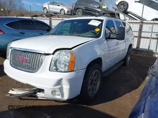 2014 GMC Yukon XL SLT with VIN 1GKS1KE00ER125405, listed as a IAAI auction lot 41609280 with 221,690 mi miles. Bid and sale history available at carsss.com. Image 2.