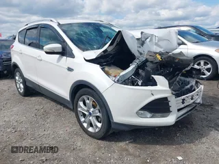 2015 Ford Escape Titanium with VIN 1FMCU0J91FUB13810, listed as a IAAI auction lot 41961798 with 139,265 mi miles. Bid and sale history available at carsss.com. Image 1.