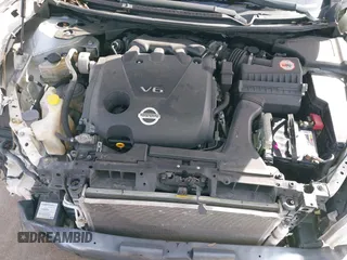 2014 Nissan Maxima SV z VIN 1N4AA5AP2EC458158, wystawiony jako IAAI lot #38598014 z przebiegiem 145 487 mil mil oraz . Historia ofert i sprzedaży dostępna na DreamBid. Obrazek 10.