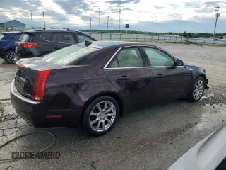2009 Cadillac CTS AWD z VIN 1G6DG577190129300, wystawiony jako Copart lot #55802785 z przebiegiem 166 399 mil mil oraz Szkoda całkowita • Salvage title. Historia ofert i sprzedaży dostępna na DreamBid. Obrazek 3.