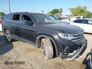 2023 Volkswagen Atlas SEL z VIN 1V2BR2CA4PC557385, wystawiony jako IAAI lot #42008233 z przebiegiem Nie podano mil oraz . Historia ofert i sprzedaży dostępna na DreamBid. Obrazek 1.