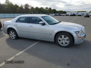 2006 Chrysler 300 C with VIN 2C3KK63H46H296625, listed as a Copart auction lot 70220974 with 104,811 mi miles and Salvage Title. Bid and sale history available at carsss.com. Image 4.
