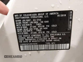 2018 Volkswagen Atlas SE with VIN 1V2KR2CA7JC574270, listed as a IAAI auction lot 41654110 with 104,440 mi miles and . Bid and sale history available at DreamBid. Image 9.