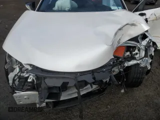 2021 Lexus UX 250h z VIN JTHX9JBH1M2037919, wystawiony jako Copart lot #46970385 z przebiegiem Nie podano mil oraz Szkoda całkowita • Salvage title. Historia ofert i sprzedaży dostępna na DreamBid. Obrazek 12.