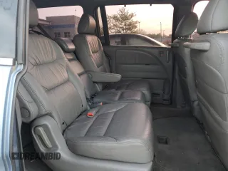 2009 Honda Odyssey EX-L with VIN 5FNRL38759B004710, listed as a Copart auction lot 54210425 with 171,674 mi miles and Salvage Title. Bid and sale history available at DreamBid. Image 11.