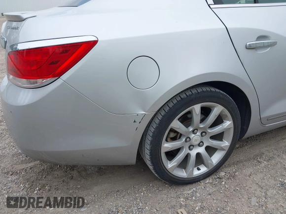 2012 Buick LaCrosse Touring with VIN 1G4GJ5E32CF322759, listed as a IAAI auction lot 42059855 with 157,470 mi miles and . Bid and sale history available at DreamBid. Image 6.