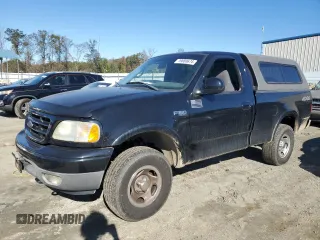 2002 Ford F-150 XL with VIN 1FTRF18232NA58109, listed as a Copart auction lot 79080674 with 148,213 mi miles and Salvage title. Bid and sale history available at DreamBid. Image 1.
