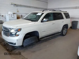 2015 Chevrolet Tahoe LTZ with VIN 1GNSKCKC9FR123996, listed as a IAAI auction lot 42113435 with 149,825 mi miles and . Bid and sale history available at DreamBid. Image 2.