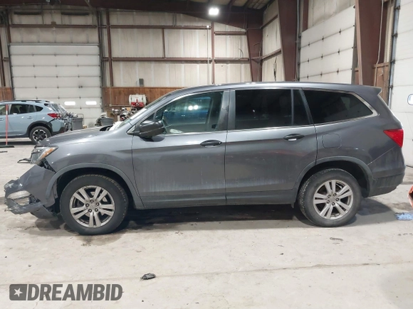 2016 Honda Pilot LX with VIN 5FNYF6H1XGB111488, listed as a IAAI auction lot 41581706 with 100,028 mi miles. Bid and sale history available at carsss.com. Image 14.