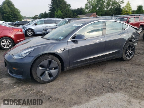 2018 Tesla Model 3 Long Range Battery z VIN 5YJ3E1EB3JF086972, wystawiony jako Copart lot #56290245 z przebiegiem 69 766 mil mil oraz Szkody całkowita. Historia ofert i sprzedaży dostępna na DreamBid. Obrazek 1.