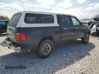 2001 Ford F-150 XLT with VIN 1FTRW08W41KF57904, listed as a Copart auction lot 47250035 with 185,985 mi miles and Clean title. Bid and sale history available at DreamBid. Image 3.