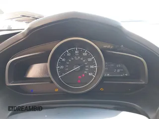 2018 Mazda 3 Touring z VIN 3MZBN1L38JM243749, wystawiony jako IAAI lot #41771812 z przebiegiem 65 533 mil mil oraz . Historia ofert i sprzedaży dostępna na DreamBid. Obrazek 7.