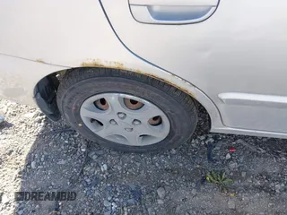 2005 Hyundai Accent GLS z VIN KMHCG45C25U623618, wystawiony jako IAAI lot #42140996 z przebiegiem 184 852 mil mil oraz . Historia ofert i sprzedaży dostępna na DreamBid. Obrazek 15.