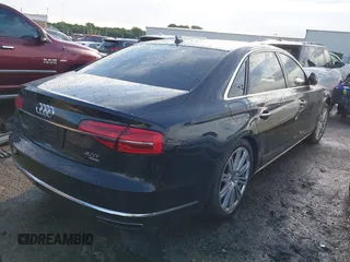 2015 Audi A8 4.0T z VIN WAU32AFD6FN022648, wystawiony jako IAAI lot #42358142 z przebiegiem 103 416 mil mil oraz . Historia ofert i sprzedaży dostępna na DreamBid. Obrazek 4.
