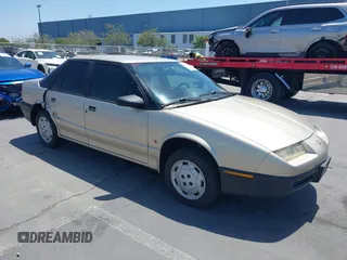 1993 Saturn SL с VIN 1G8ZF5593PZ201935, выставлен на аукционе IAAI как лот 42493004 с пробегом 200 987 миль миль и . История ставок и продаж доступна на DreamBid. Изображение 1.