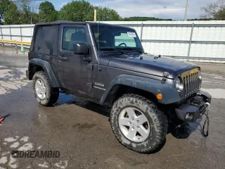 2017 Jeep Wrangler Willys Wheeler with VIN 1C4AJWAG2HL527192, listed as a Copart auction lot 58169245 with 88,737 mi miles and Salvage title. Bid and sale history available at DreamBid. Image 4.