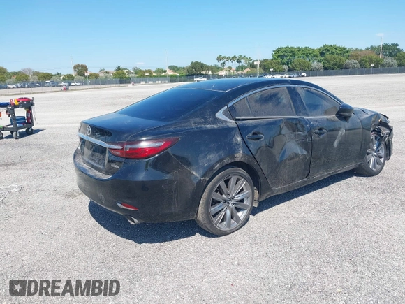 2020 Mazda 6 Touring with VIN JM1GL1VMXL1517828, listed as a IAAI auction lot 41511804 with 123,174 mi miles. Bid and sale history available at carsss.com. Image 4.