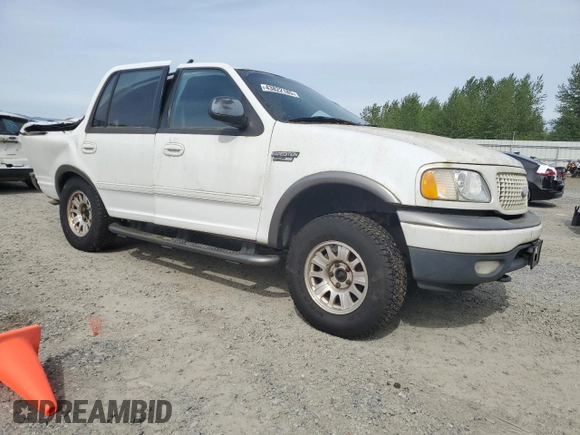 2000 Ford Expedition XLT with VIN 1FMRU166XYLA67790, listed as a Copart auction lot 43822185 with Not Provided miles and Salvage Title. Bid and sale history available at DreamBid. Image 4.