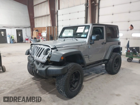 2014 Jeep Wrangler Sport with VIN 1C4AJWAG0EL173362, listed as a IAAI auction lot 42231863 with 99,321 mi miles and . Bid and sale history available at DreamBid. Image 17.