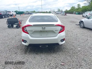 2019 Honda Civic Sport with VIN 19XFC2F85KE019311, listed as a IAAI auction lot 42319241 with 163,241 mi miles and . Bid and sale history available at DreamBid. Image 16.