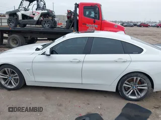 2018 BMW 4 Series 440i with VIN WBA4J5C56JBF07087, listed as a IAAI auction lot 41421921 with 61,601 mi miles and . Bid and sale history available at DreamBid. Image 14.