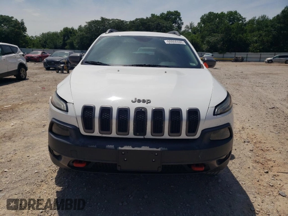 2016 Jeep Cherokee Trailhawk with VIN 1C4PJMBS3GW102000, listed as a Copart auction lot 60866505 with 120,985 mi miles and Salvage title. Bid and sale history available at DreamBid. Image 5.