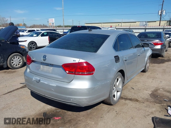 2013 Volkswagen Passat SE w/Sunroof with VIN 1VWBH7A34DC003147, listed as a IAAI auction lot 41662970 with 153,897 mi miles. Bid and sale history available at carsss.com. Image 4.