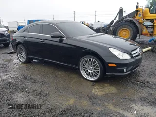 2009 Mercedes-Benz CLS-Class 5.5L with VIN WDDDJ72X59A142519, listed as a IAAI auction lot 41120381 with 74,270 mi miles. Bid and sale history available at carsss.com. Image 1.